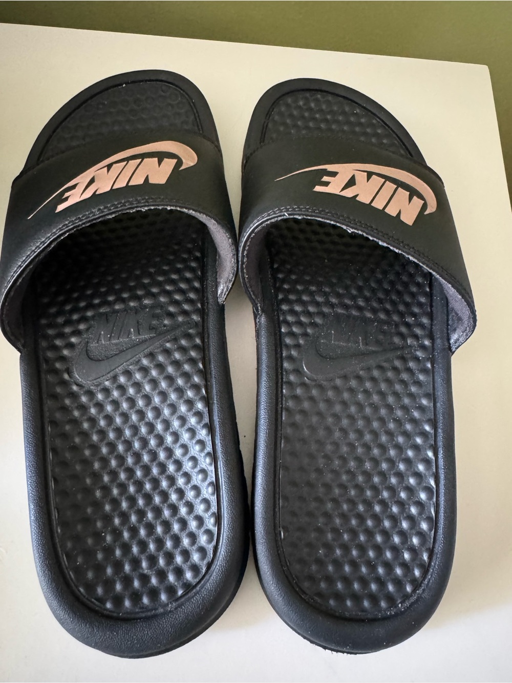 Nike Black Slip-On Sports Sandal with White Swoosh